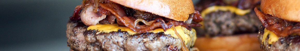 Eating American (Traditional) Burger at Blazing Onion Burger Company restaurant in Snohomish, WA.